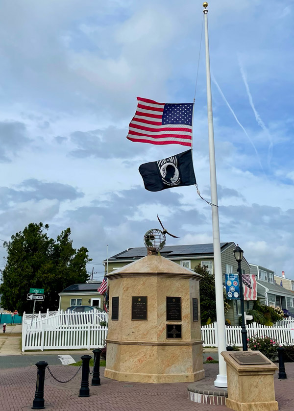 Village flags at half staff
